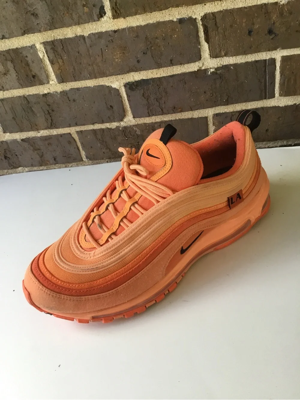 Nike Women’s Air Max 97 in Orange and Coral